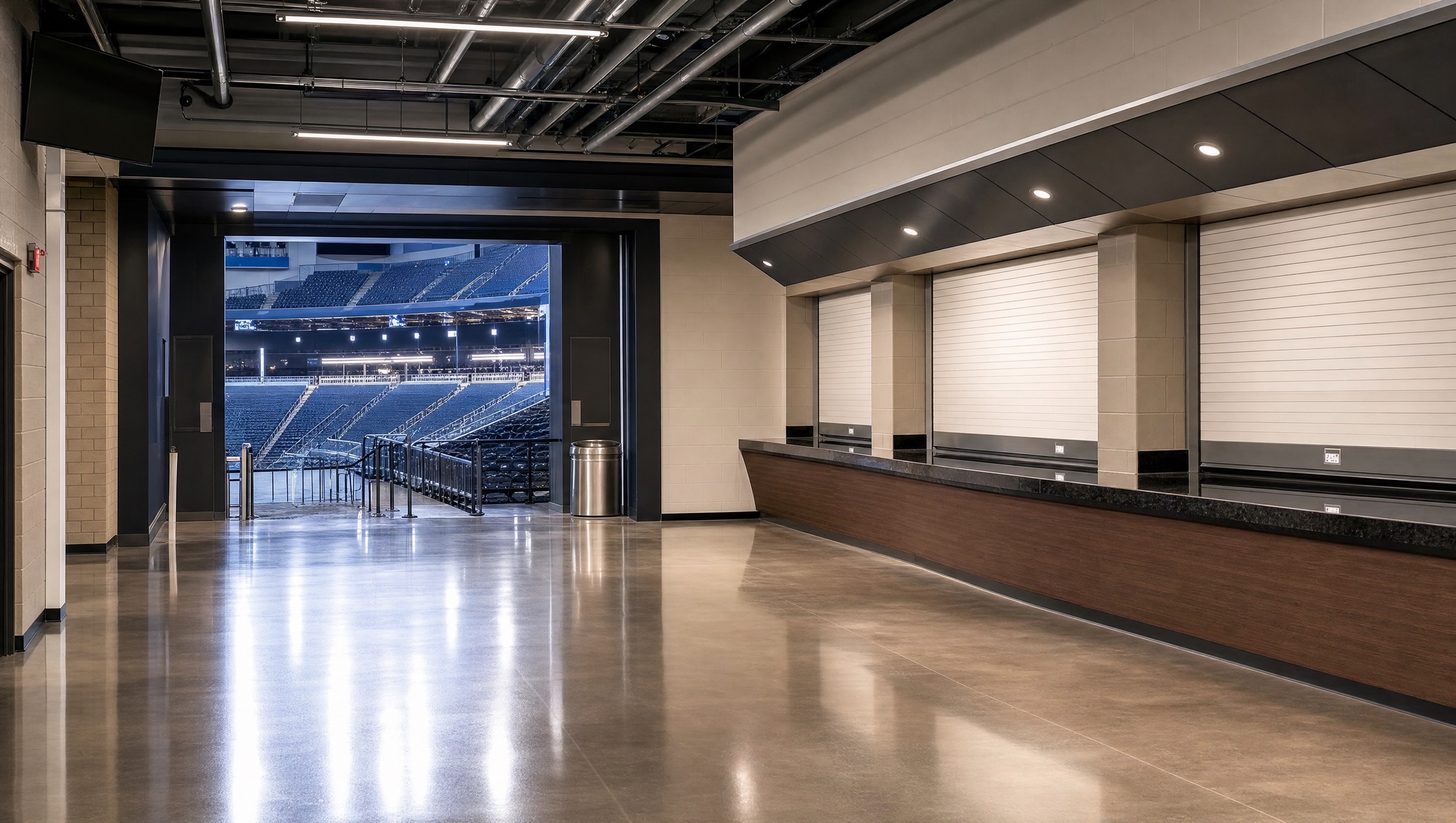 Clean sports arena concourse with gleaming floors after post-event cleaning